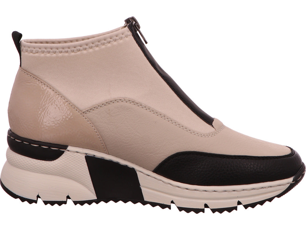Rieker dameslaarzen in een beige en veelkleurige combinatie.