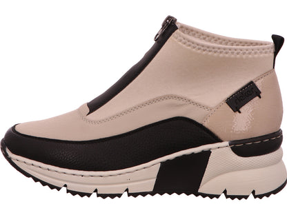 Rieker dameslaarzen in een beige en veelkleurige combinatie.